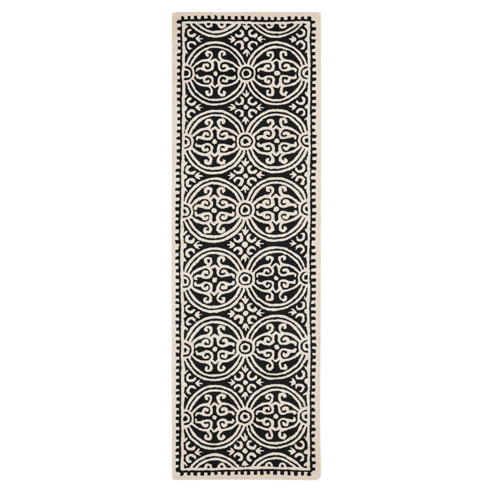 2'6inx8' Runner Black/Ivory Geometric Tufted - Safavieh