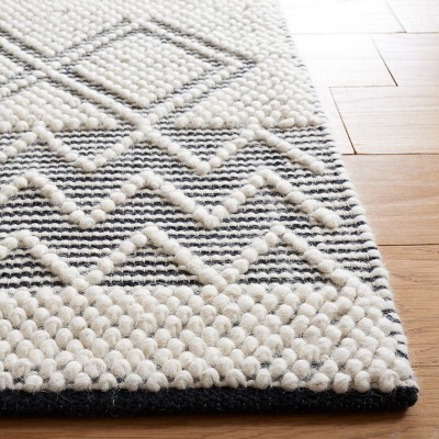 Black and Ivory Hand Tufted Wool 3' x 5' Area Rug