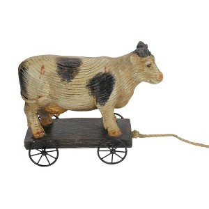 Northlight 10.25" Black and White Wood Textured Cow on Cart Outdoor Garden Statue - 1 of 3