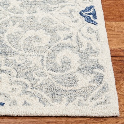 Ivory and Blue Hand-Tufted Wool Rectangular Area Rug, 5' x 8'