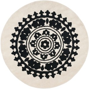 Soho SOH732 Hand Tufted Indoor Rug - Safavieh - 1 of 3