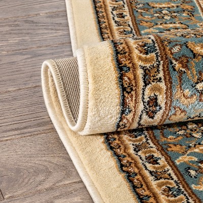 Ivory and Blue Medallion 5' x 7' Synthetic Area Rug