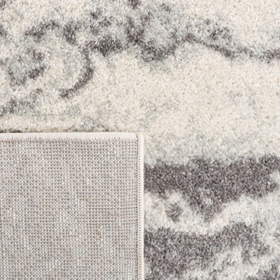 Ivory Elegance 63" Hand-Knotted Boho-Chic Synthetic Area Rug
