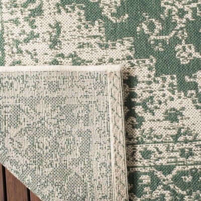 Green and Creme Medallion Synthetic 9' x 12' Tufted Area Rug