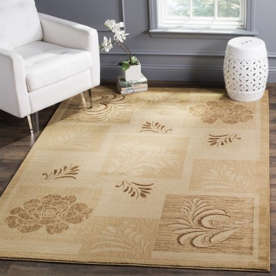 Ivory and Multi 12' x 15' Synthetic Patchwork Area Rug