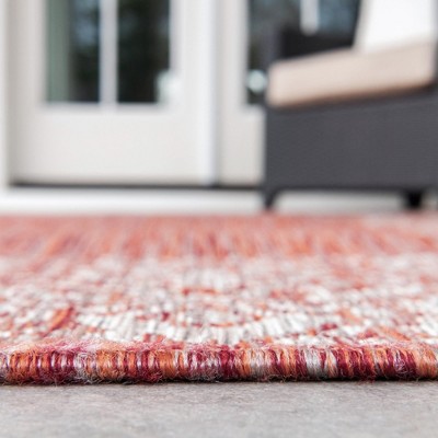 Rust Red and Ivory Synthetic Outdoor Rectangular Area Rug