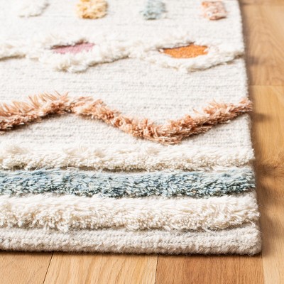 Handmade Ivory Wool Rectangular 6' x 9' Rug
