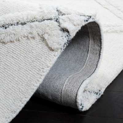 Ivory Hand-Tufted Wool Shag Area Rug, 5' x 8'