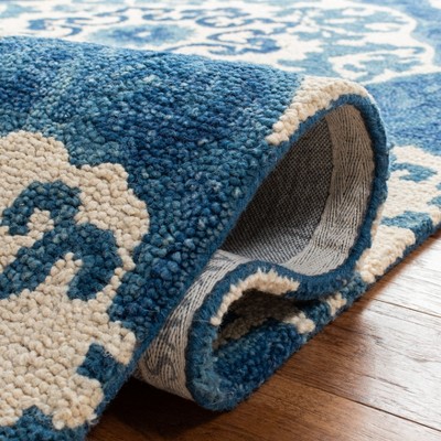 Handmade Blue and Ivory Wool Tufted Area Rug 4' x 6'