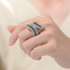 Guili Sterling Silver Rhodium-Plated Bypass Ring with Sapphire Cubic Zirconia for a Timeless, Elegant Sparkle. Green or Blue, Sizes 6-8. - 3 of 3