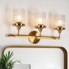 LNC Banswara 22.8-in 3-Lights Polished Gold and Ripple Glass Cylinder Modern/Contemporary Bathroom Vanity Lights - 2 of 4