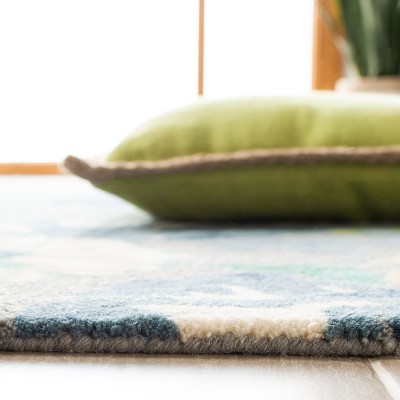Blue Floral 5' x 8' Handmade Wool and Viscose Area Rug