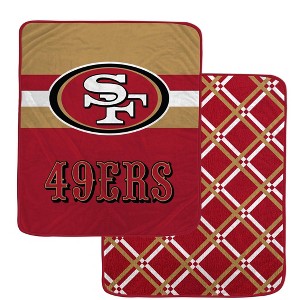 NFL San Francisco 49ers Center Logo Half Stripe Diamond Faux Shearling Blanket - 1 of 1