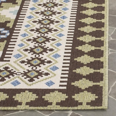 Veranda Chocolate & Green Synthetic Rectangular Indoor/Outdoor Rug