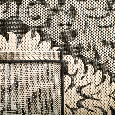 Black and Sand Floral Motif Indoor/Outdoor Area Rug