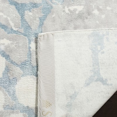Turquoise and Ivory Hand-Knotted Wool and Viscose Area Rug, 6' x 9'