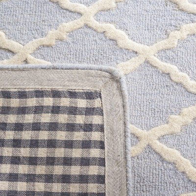 Light Blue and Ivory Hand-Tufted Wool 4' x 6' Area Rug