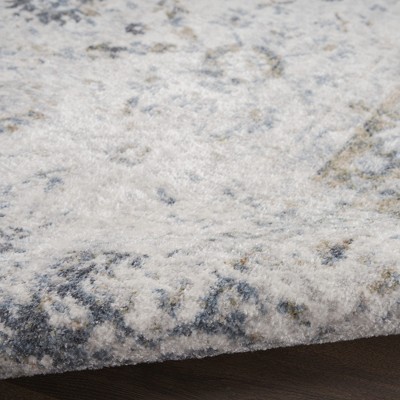 Ivory Blue Floral Synthetic 8' x 10' Washable Rug