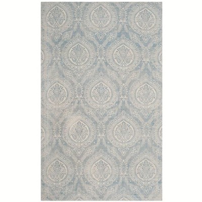 Turquoise and Ivory Flat Woven Wool Area Rug, 5' x 8'