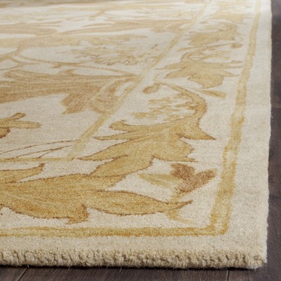 Antiquity Beige and Gold Hand-Tufted Wool Area Rug