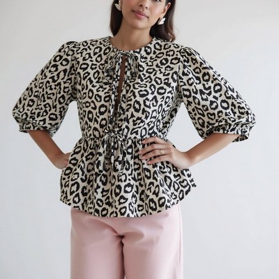 Knit & Lounge Women’s Animal Print Puff Sleeve Peplum Blouse Tie Front Split Neckline Adjustable Waist Feminine Statement Top