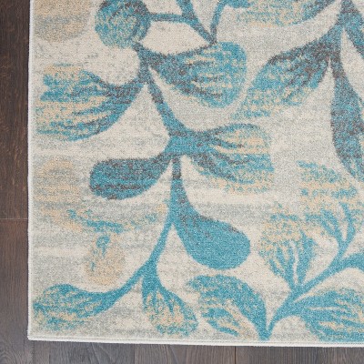 Ivory and Turquoise Floral Synthetic 6' x 9' Area Rug