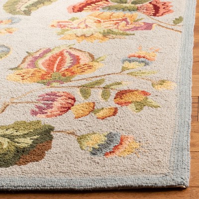 Handmade Light Blue Floral Wool Rectangular Area Rug
