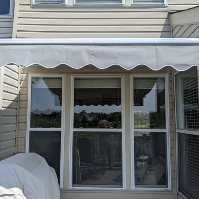 Ivory Retractable Patio Awning with White Frame