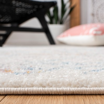 Ivory and Turquoise Synthetic Runner Rug, 2' x 5'