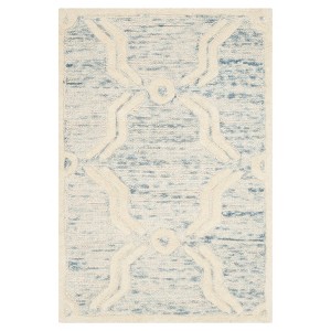 Light Blue/Ivory Abstract Tufted Accent Rug - (2