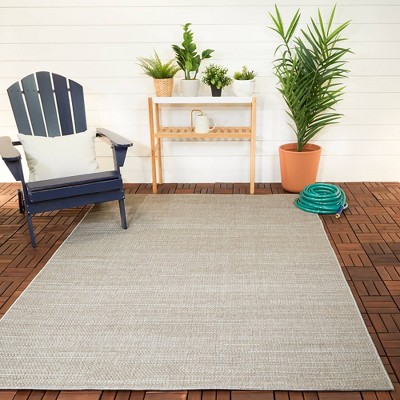 Beige Synthetic 8' x 10' Easy-Care Rectangular Indoor/Outdoor Rug