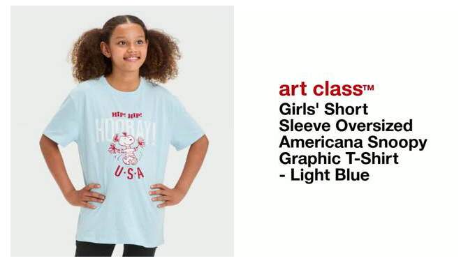 Girls' Short Sleeve Oversized Americana Snoopy Graphic T-Shirt - art class™ Light Blue, 2 of 5, play video