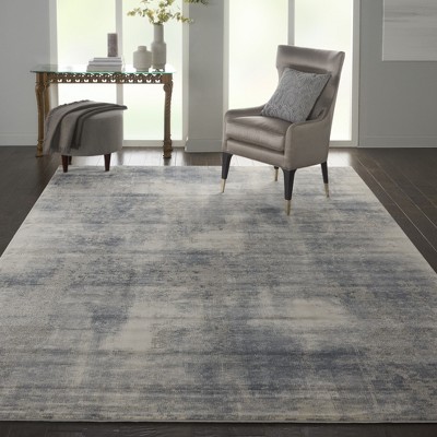 Modern Abstract Blue & Ivory Synthetic 9'3" x 12'9" Area Rug