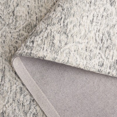 Ivory Tufted Handmade Wool 6' x 9' Area Rug