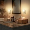 YANSUN 0. 6W Plug-in White Motion Sensor OvalNight Light with 3-Mode Dimming, Warm 3000K Soft LED, Auto/On/Off Modes 2 Packs - 3 of 4