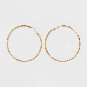 Tubular Hoop Earrings - A New Day™ Gold: Leverback Closure, Steel Nickel-Free Metal, 3.1" Diameter, Lightweight Design - 1 of 3