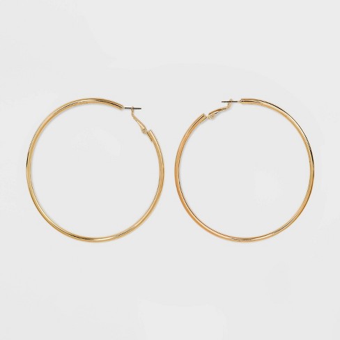 Tubular gold hoop deals earrings