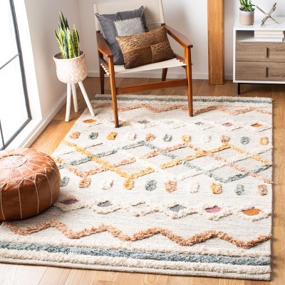 Handmade Ivory Wool Rectangular 6' x 9' Rug