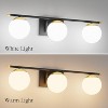 Runesay Black and Gold Bathroom Lights 3-Light Mid Century Modern Milky Glass Black and Gold Vanity Lights for Bathroom - 3 of 4