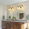 PAKOKULA 3-Light Black and Gold Bathroom Vanity Light With Cone Milk Glass Shade - 2 of 4
