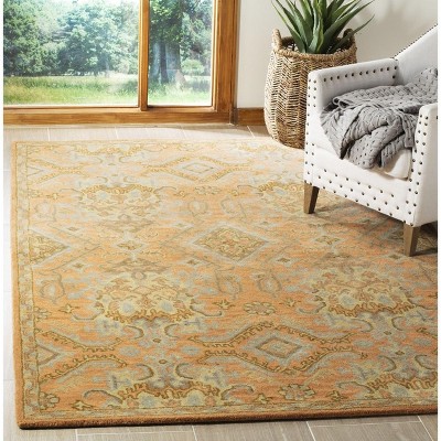 Handmade Terracotta Floral Wool Area Rug, 8'9" x 12'