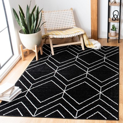 Braided Round Black and Ivory Synthetic Rug, 4' x 6'