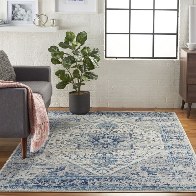 Ivory and Light Blue Synthetic 6' x 9' Easy Care Rug