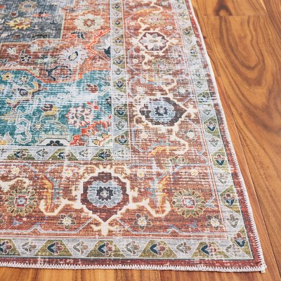 Rust and Blue Green 4' x 6' Synthetic Washable Area Rug
