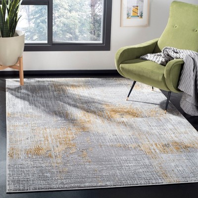 Grey and Beige Abstract Synthetic Area Rug 4' x 6'