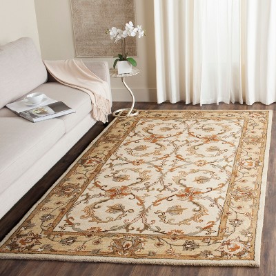 Ivory Hand-Tufted Wool Rectangular 6' x 9' Area Rug