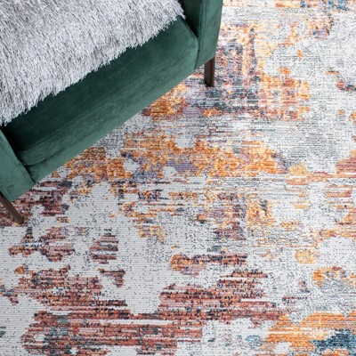 Ivory and Blue Abstract Hand-Knotted Synthetic Area Rug