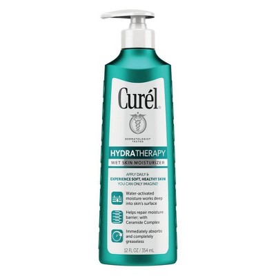 putting moisturizer on wet skin