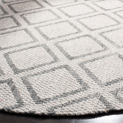 Hand-Tufted Elegance Round 59" Gray Wool Area Rug