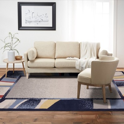 Navy and Red Synthetic Stain-Resistant Area Rug, 5'3"x7'5"